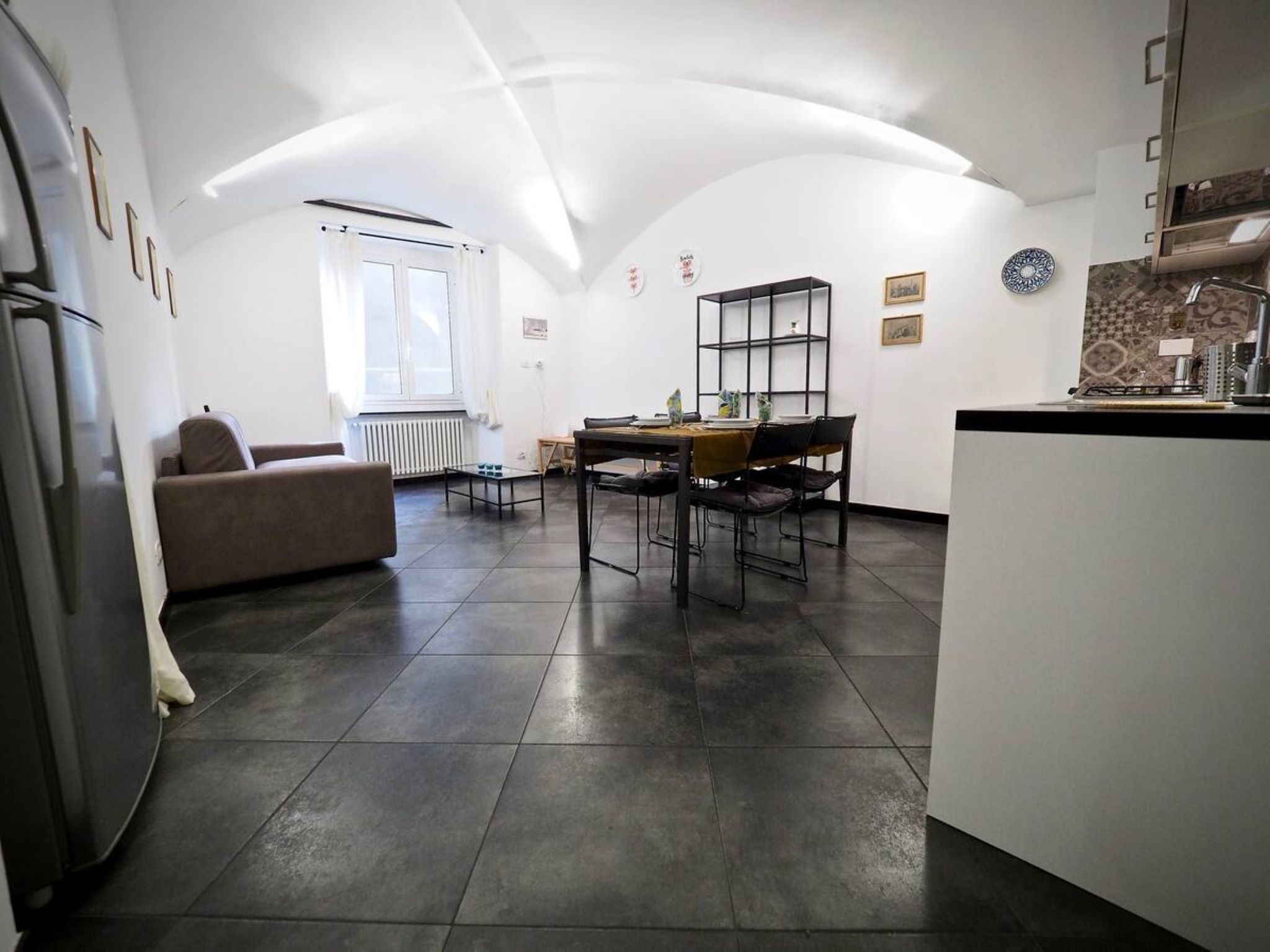 alloggio affitta camere soggiorno piazza dell'agnello casa genova gli appartamenti di ema zona giorno con cottura